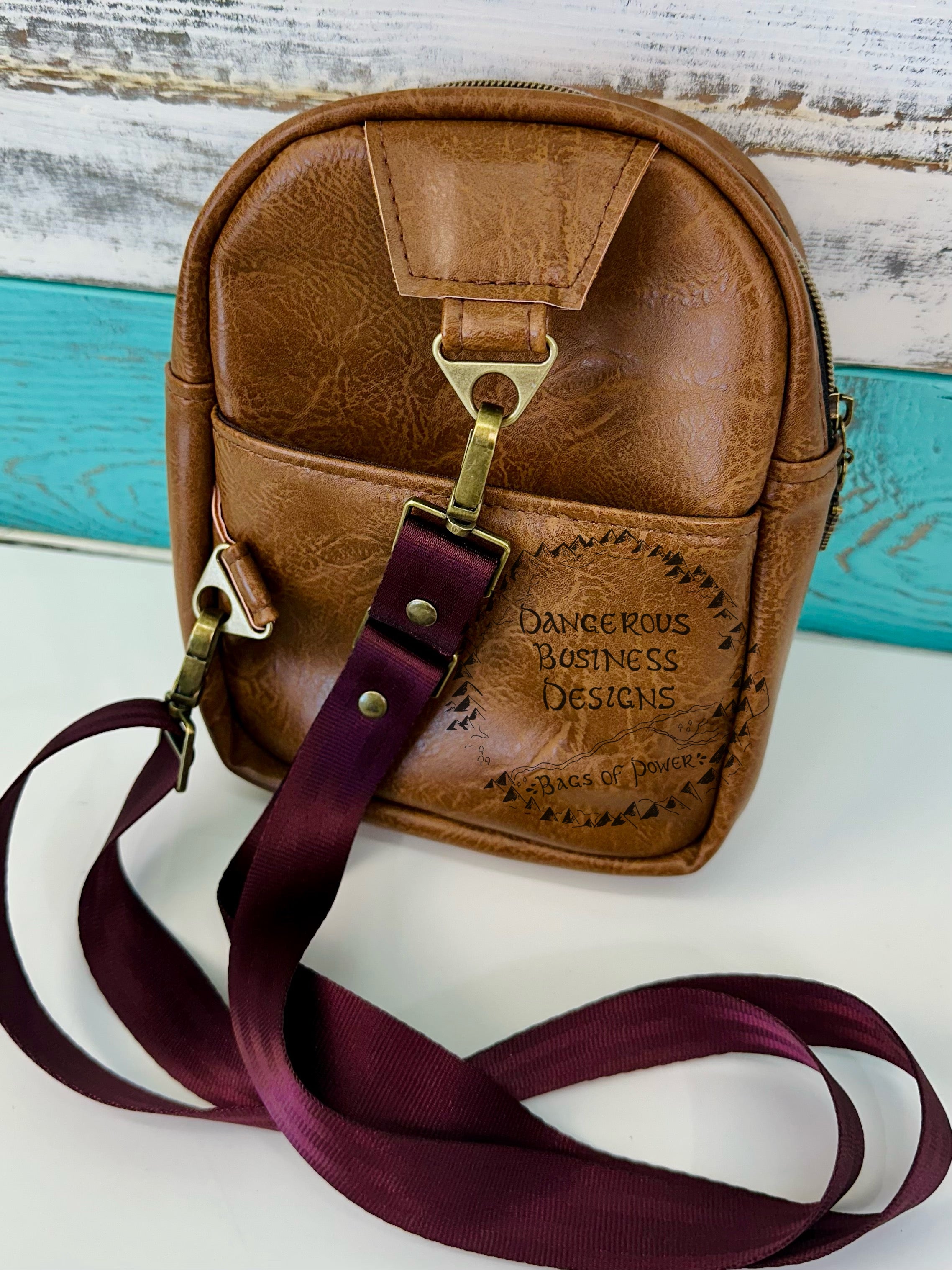 Books Mini sling backpack MD